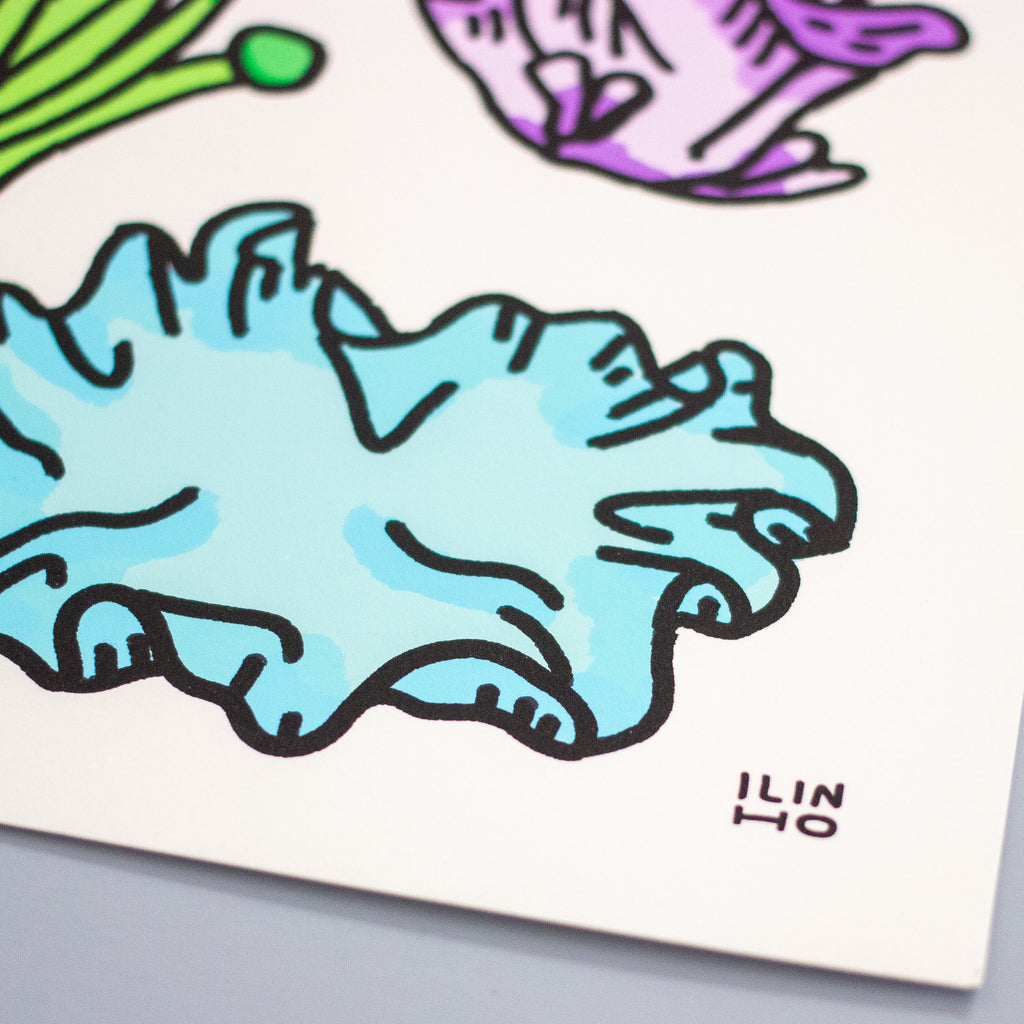 A close-up of a white art print featuring a stylised illustration of a light blue mushroom with black outlines, along with partial purple and green floral elements. The artist's signature 'ILIN' is visible in the bottom right corner.
