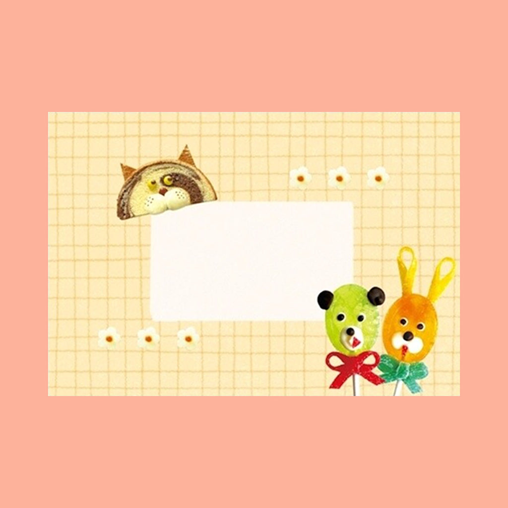 A cute pastel-themed card featuring a blank white rectangle in the center, surrounded by a yellow grid pattern. A brown cat peeking from behind the top left corner, a green bear with a red bow, and an orange bunny with yellow ears decorate the design.