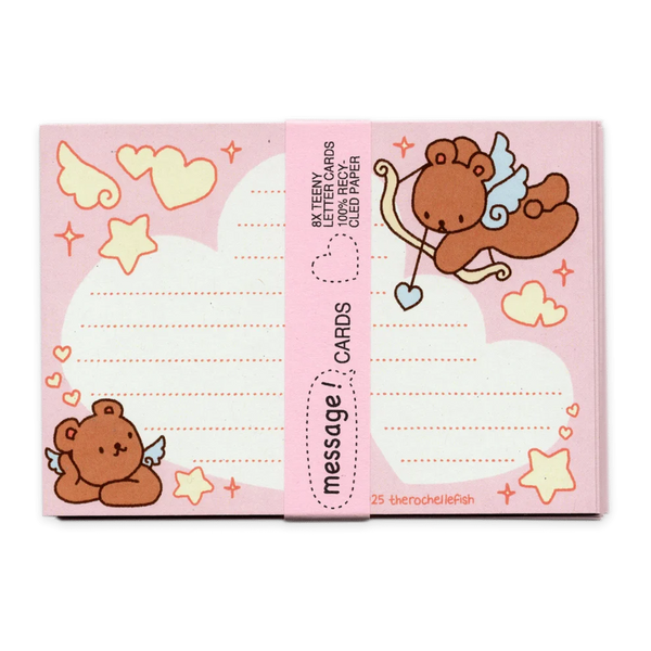A pink pack of cute message cards featuring cartoon teddy bears, clouds, stars, and hearts, wrapped with a pink paper band labeled 'message cards'.