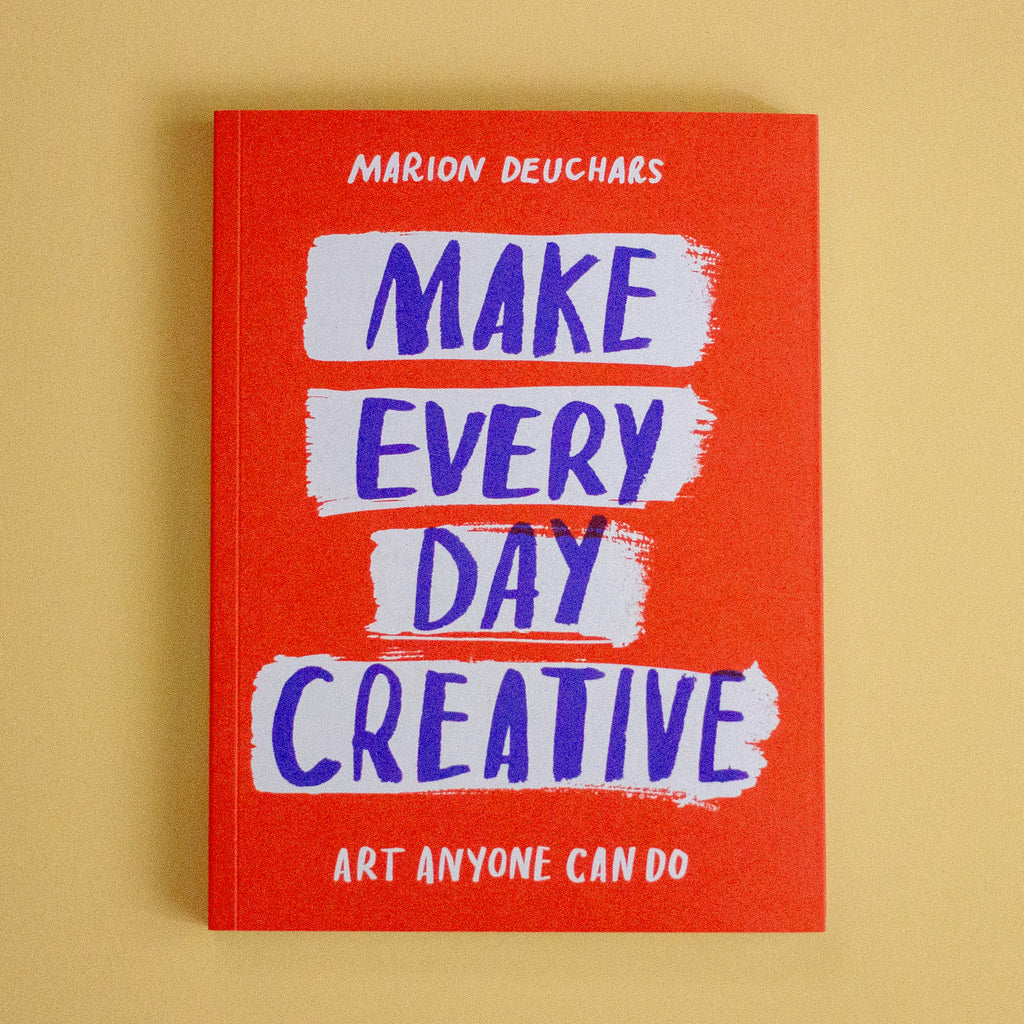 A book titled 'Make Every day Creative' on a yellow background