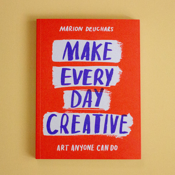 A book titled 'Make Every day Creative' on a yellow background