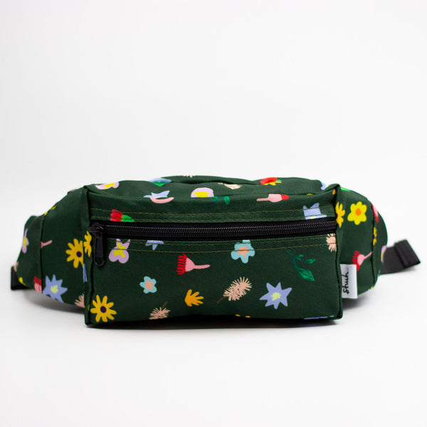 Green fanny pack with colorful floral patterns on a white background