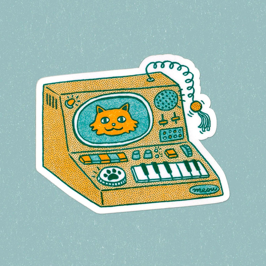 A die-cut sticker featuring a retro, dotted-style illustration of a cat connected to a toy synthesizer. The cat is depicted inside a television screen on the synthesizer, and a coiled toy tail with a tassel hangs from the top right.
