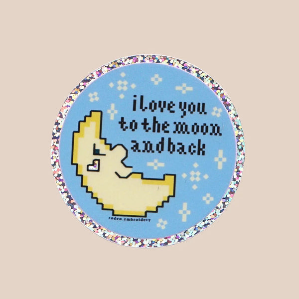 Round pixel art sticker with a moon and text 'I love you to the moon and back' on a beige background.