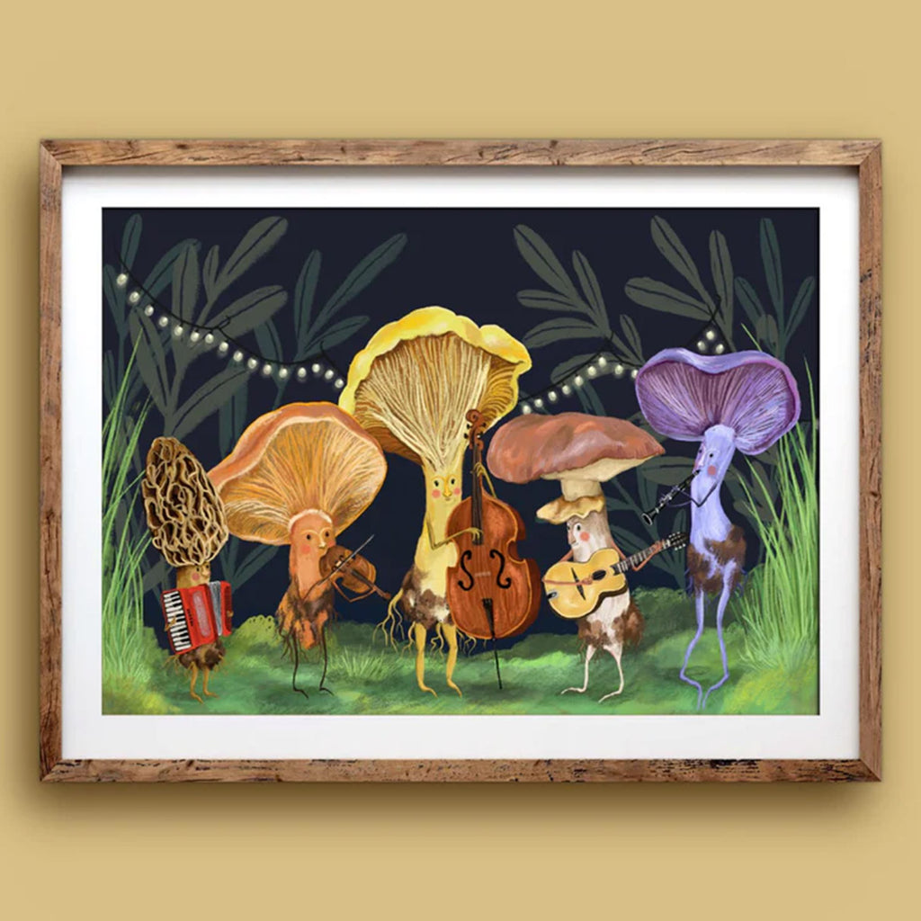Framed artwork of mushrooms playing musical instruments on a wall.