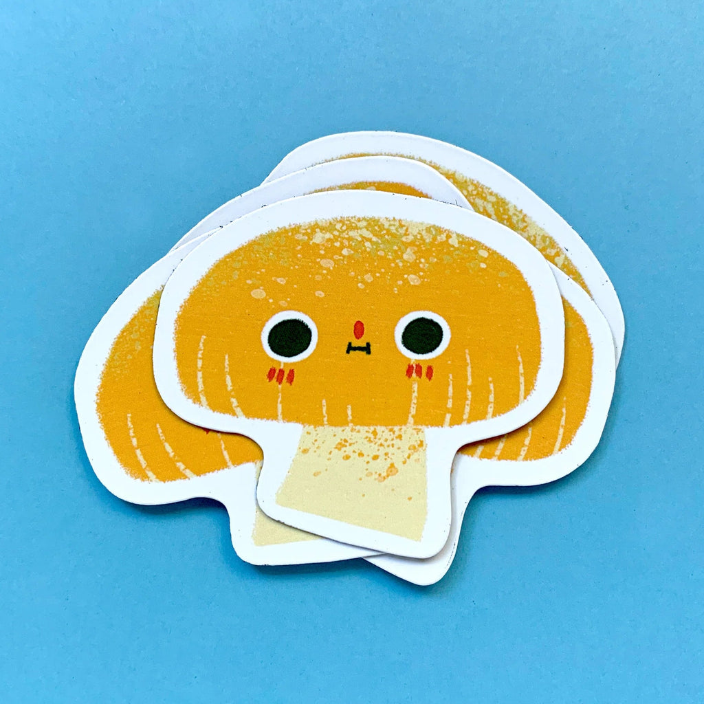 Magnet of a cartoon mushroom with a happy expression on a blue background