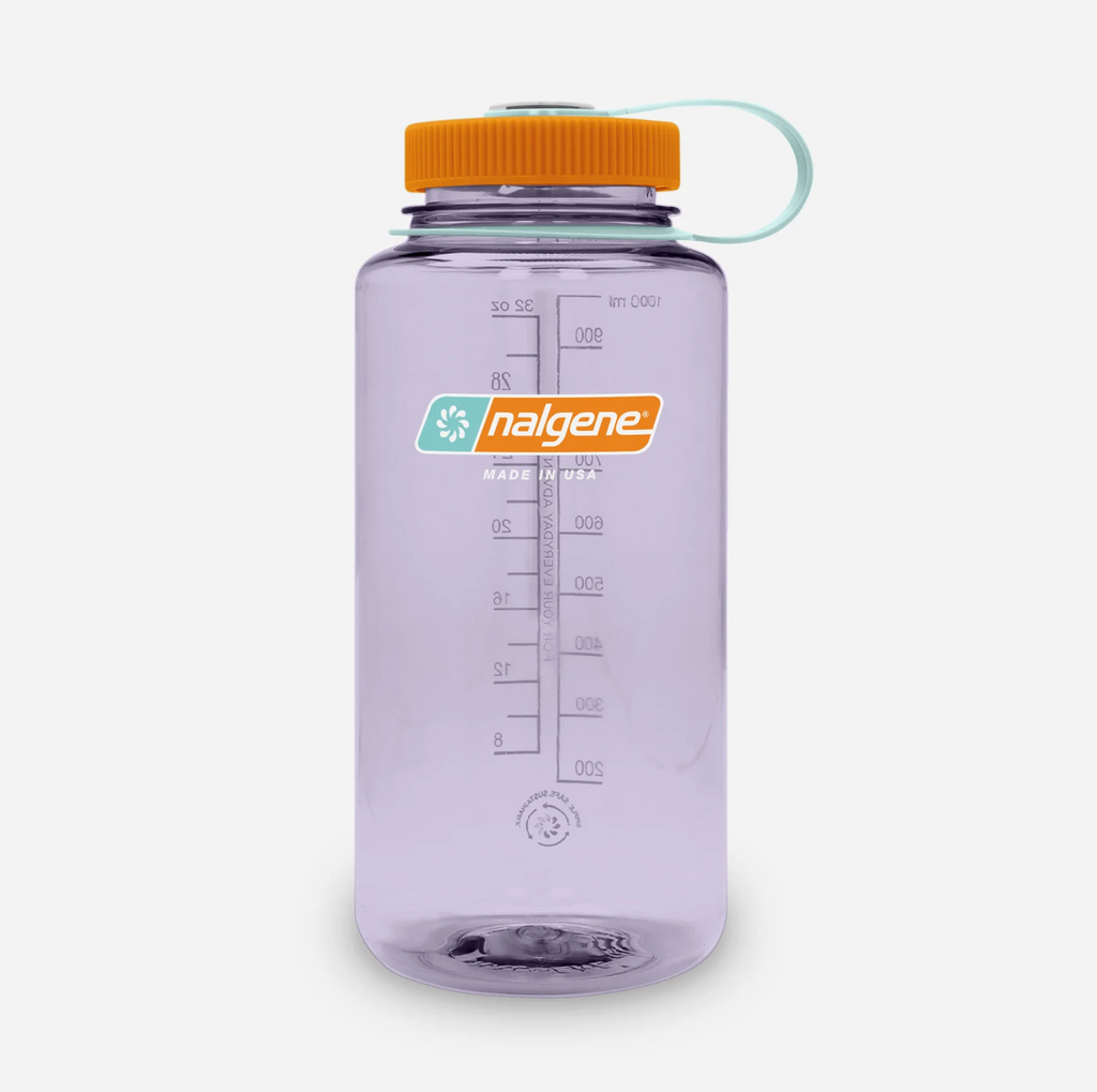 A translucent light purple Nalgene water bottle with an orange screw cap and a aqua loop handle, shown on a light grey background.