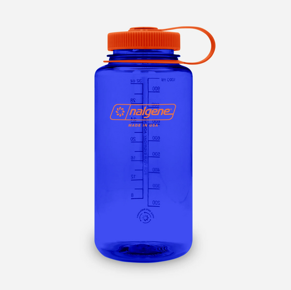 Blue water bottle with orange cap on a white background