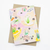 A front view of the Native print card. Multiple native plants over a colourful grid background.