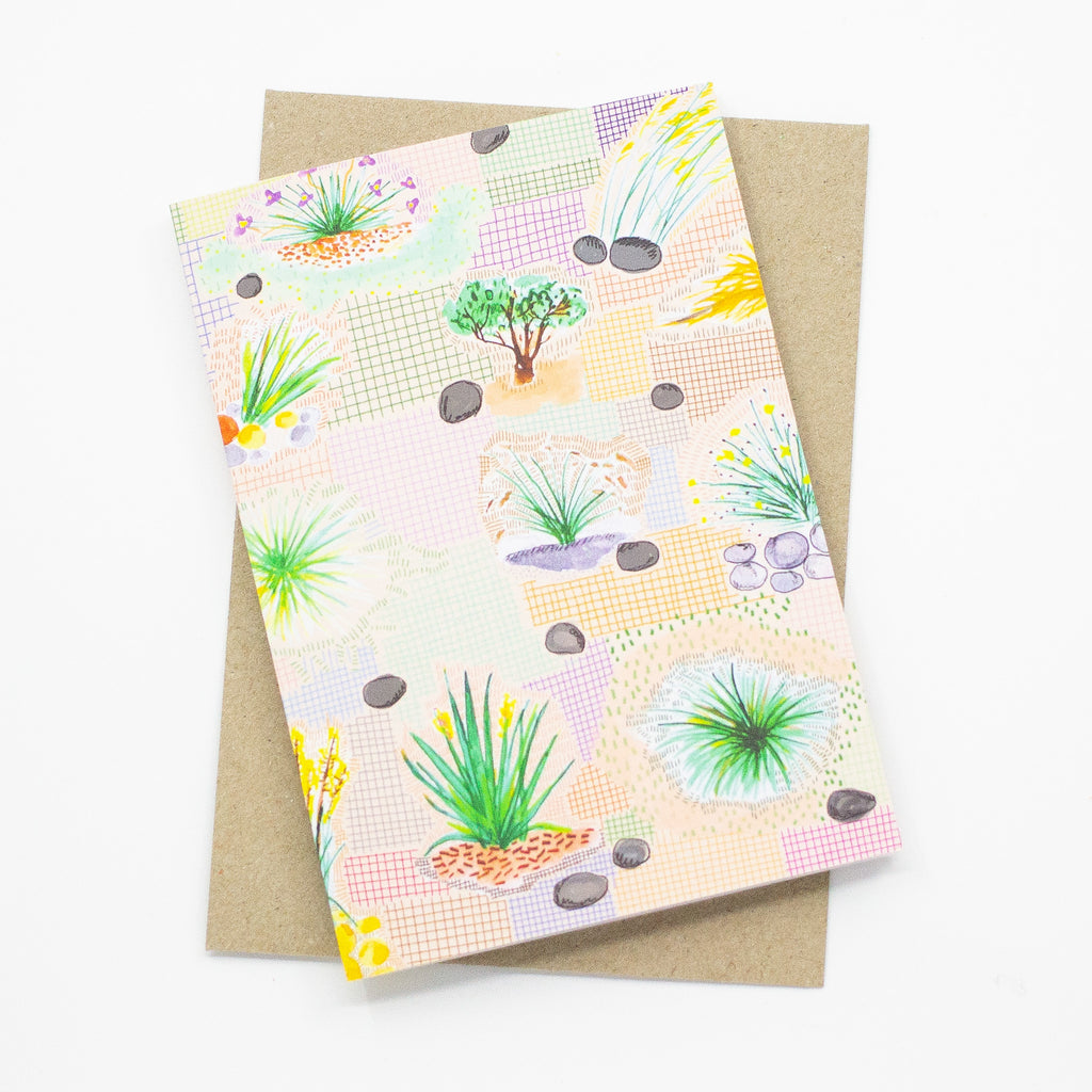 A front view of the Native print card. Multiple native plants over a colourful grid background.