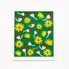 A top view of the shuh and spruce native flora dish cloth. Yellow and pink flowers on a green background. 