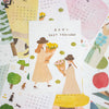 A 2027 calendar spread out with multiple illustrated pages visible, featuring pastel drawings of two women holding flower bouquets, trees, an apple, and monthly calendar grids.