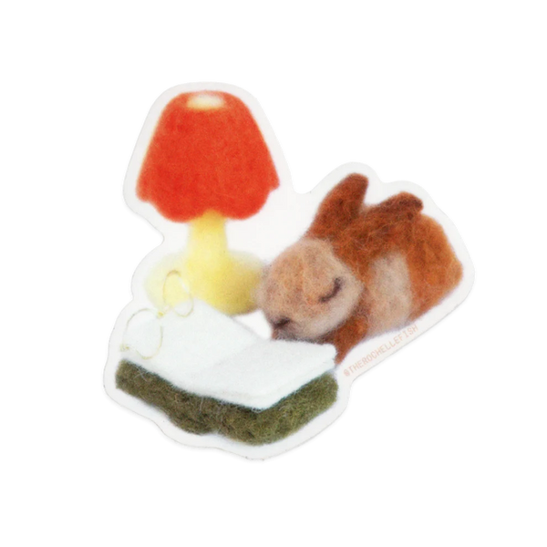 Die cut sticker of a mall plush toy of a mouse with a red mushroom on a white background. 