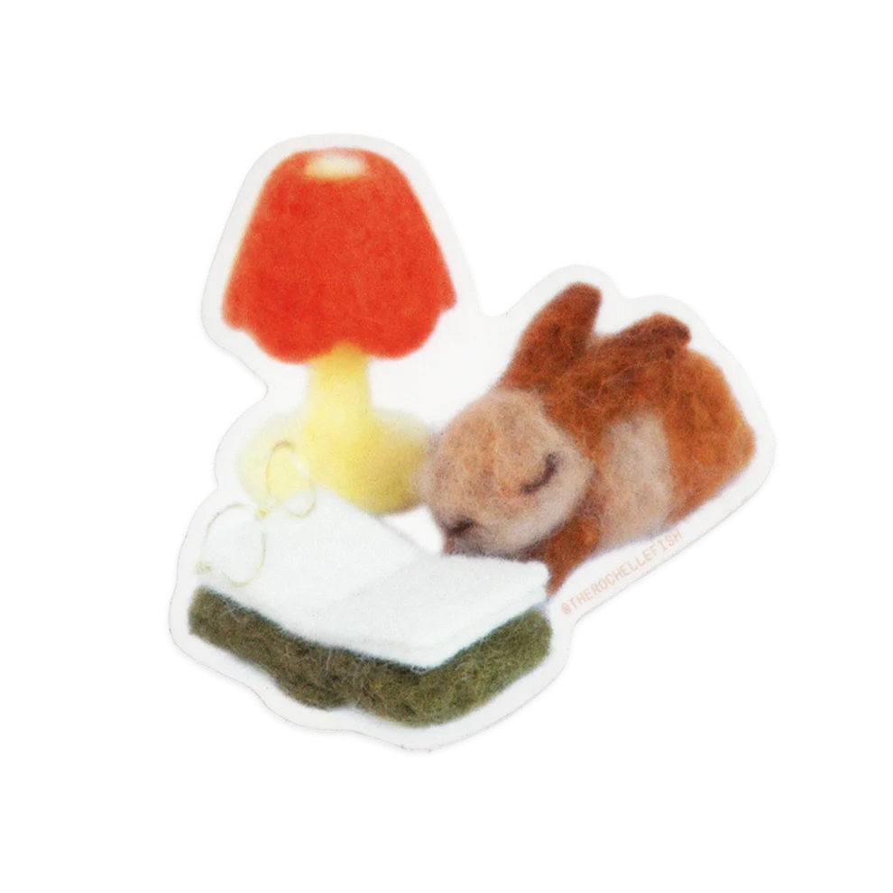 Die cut sticker of a mall plush toy of a mouse with a red mushroom on a white background. 