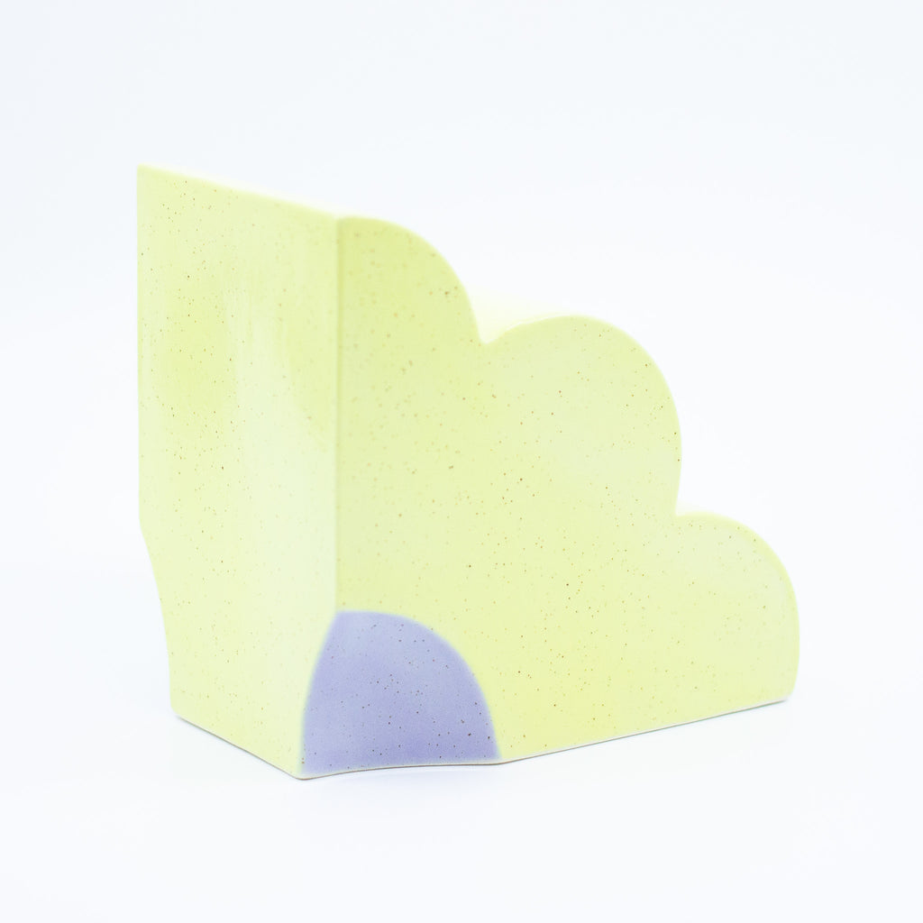 Back view of Pansy quarter flower bookend. 
