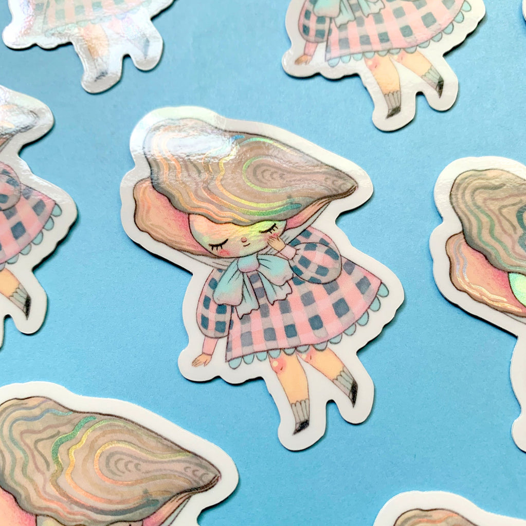 Sticker of a girl with a shell hat on a blue background