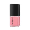 Pink nail polish bottle with black cap on a white background