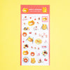 A vertical clear sticker sheet featuring cute cartoon bunny and cat breakfast-themed illustrations, including pancakes, strawberries, and the words 'LOVE', displayed on a solid yellow background.