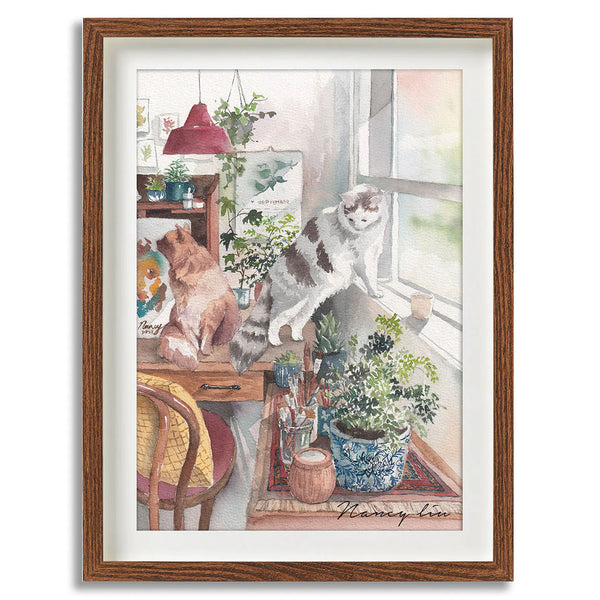 Framed artwork of cats and plants in a room setting