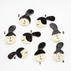 A Top View of the Ponytail collection of ceramic brooches. Numbered so you can choose your favourite. 