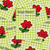 A sheet of die-cut vinyl stickers featuring a red flower with a smiling face and green stem, arranged on a light green and white gingham background. The central sticker reads 'Always Friends' in a retro handwritten font.