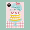 A postcard with birthday greeting card featuring an illustrated layered cake on a stand, topped with strawberries, under a light blue dome with a pink bow and the words 'Happy Birthday!'. 