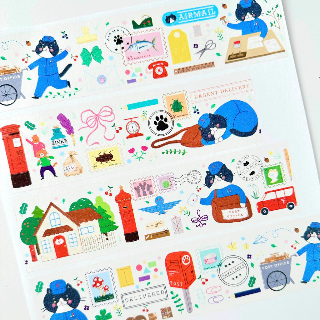A sheet of decorative washi tape featuring colourful post office and delivery-themed illustrations, including a cat in a blue uniform, red post boxes, stamps, mailers, and a house on a white background.