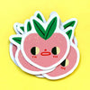 Stack of cute pink peach-shaped magnets with green leaves on a yellow background