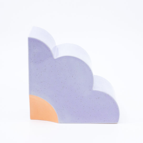 Side view of the lilac bookend, with peach highlight. 