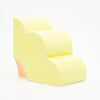 Side view of the sunny yellow quarter flower bookend. 