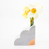 Lilac abstract vase with yellow flowers on a white background