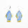 Two ceramic drop earrings with sterling silver hooks. Pendants are fish shaped with blue and white stripes, and yellow tails with black polkadots. 