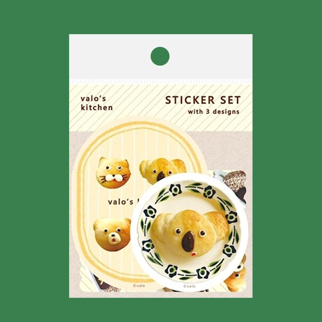 A sticker set from 'valo's kitchen' featuring cute cartoon koala bear and cat illustrations on various shapes and patterns, displayed on a green background.
