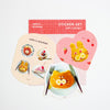 A cute sticker set from 'valo's kitchen' featuring three whimsical designs: a round plate-shaped sticker with pancakes, a pink heart-shaped sticker with a bunny, and a cat-shaped pancake, displayed on a clean white background.