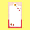 A small notepad with a cute cartoon food and animal illustration.