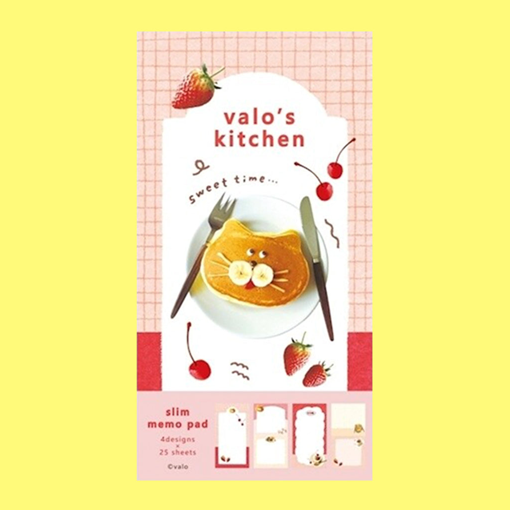 A small notepad with a cute cartoon food and animal illustration on the cover.