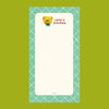 A small notepad with a cute cartoon food and animal illustration.