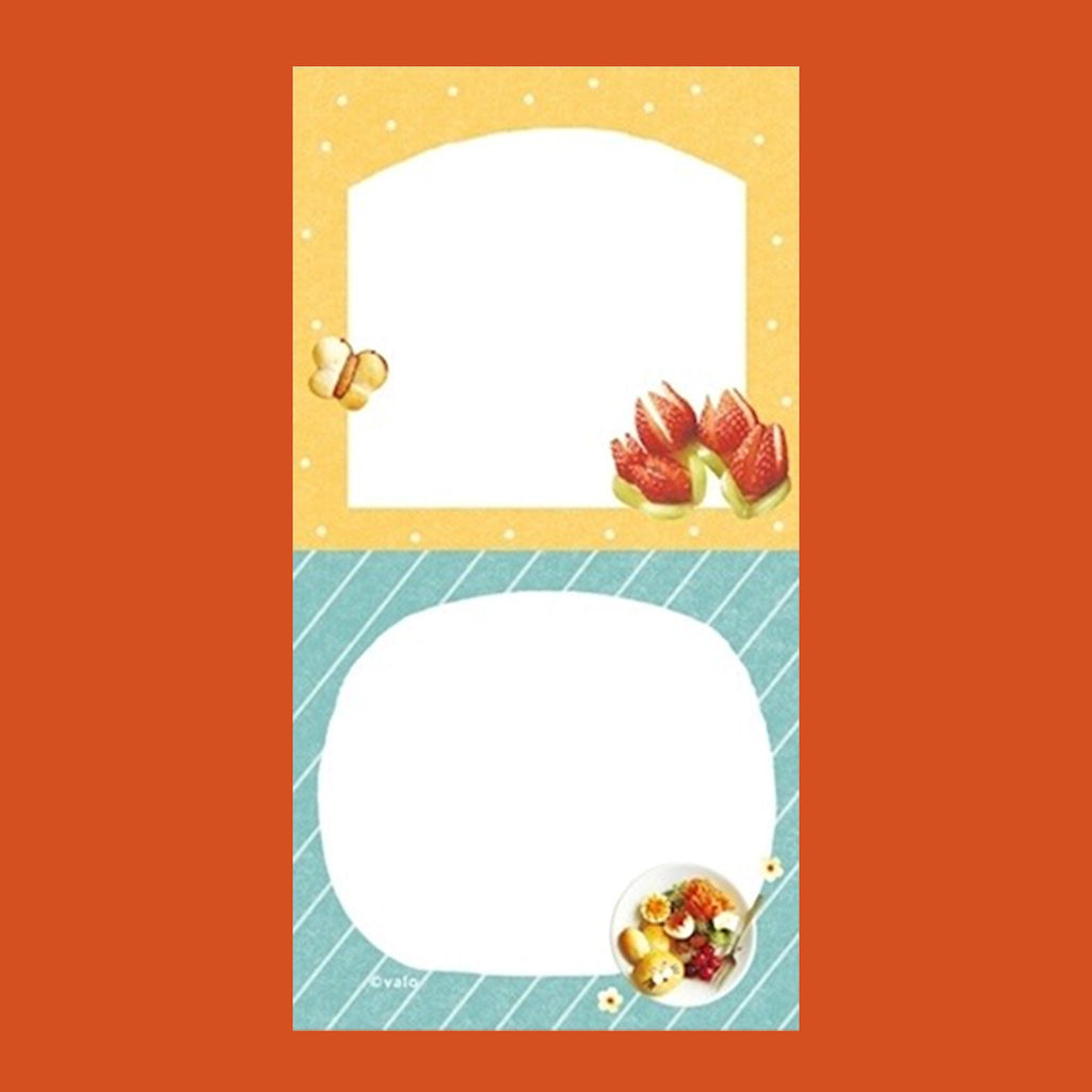 A small notepad with a cute cartoon food and animal illustration.