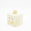 Side view of the sonia square vase. Natural colour with orange smile. 