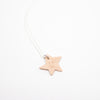 Star-shaped pendant on a white background