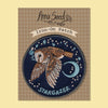 Iron-on patch with an owl design and 'Stargazer' text, branded 'Anna Seed', on a checkered background.