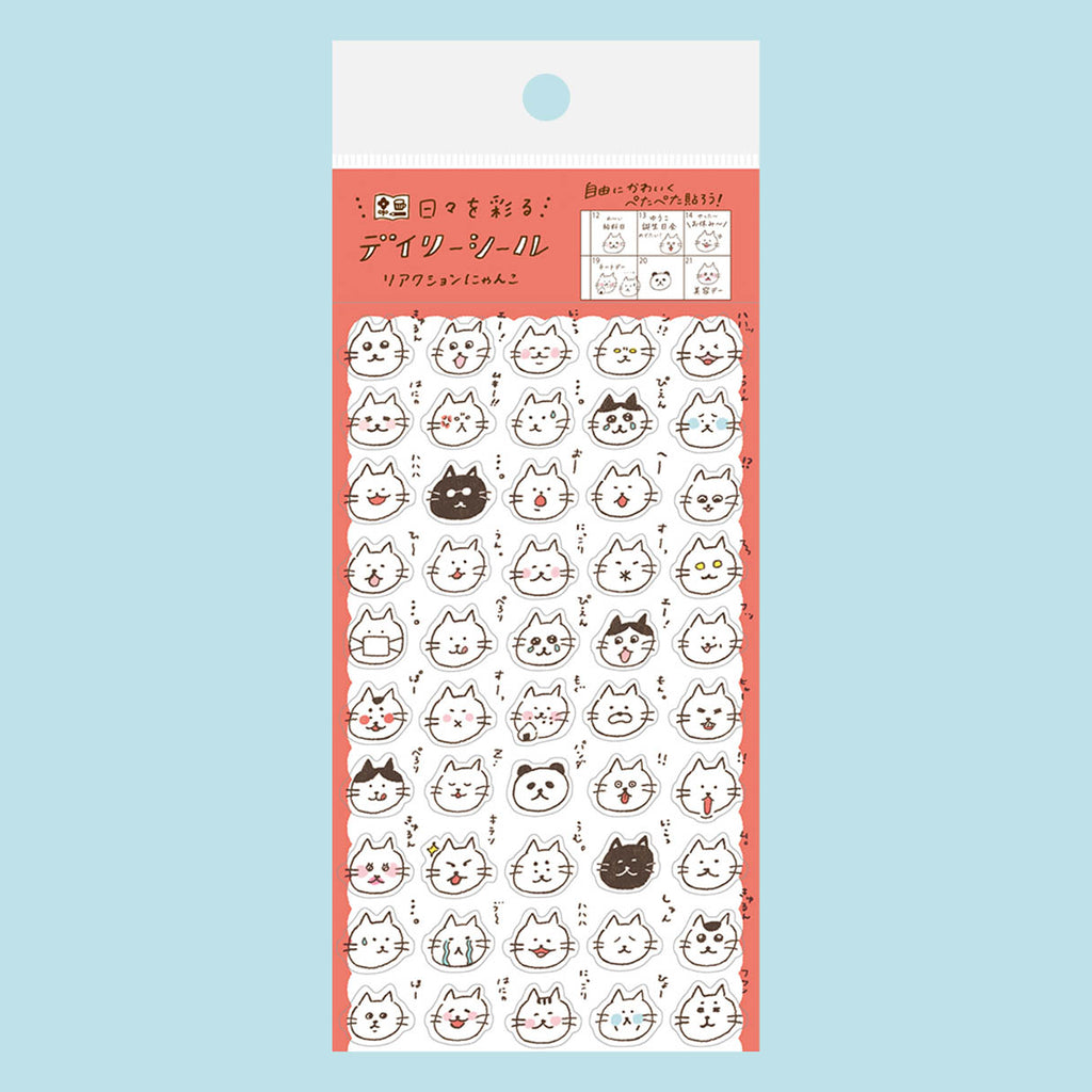 A package of cute cartoon cat face stickers with various expressions, featuring a coral pink border and a white header card, shown against a solid light blue background.