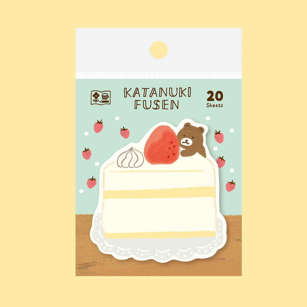 Cake-themed sticky note with a bear illustration on a light blue background.