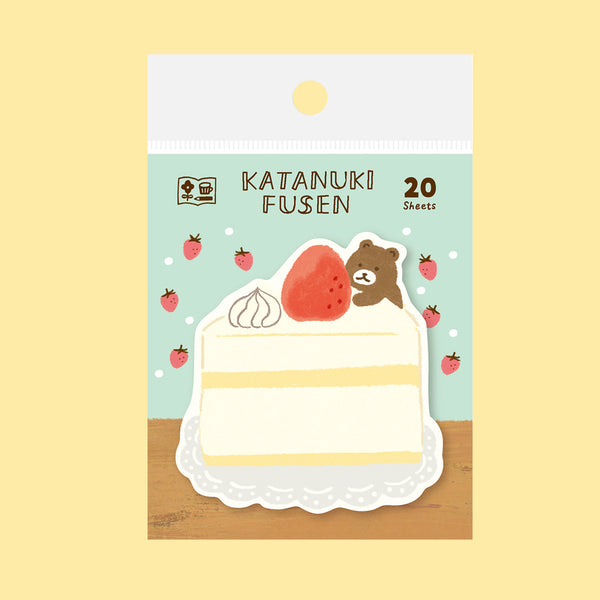 Cake-themed sticky note with a bear illustration on a light blue background.