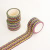 Three rolls of decorative washi tape with a colourful wavy stripe pattern, displayed on a clean white background.