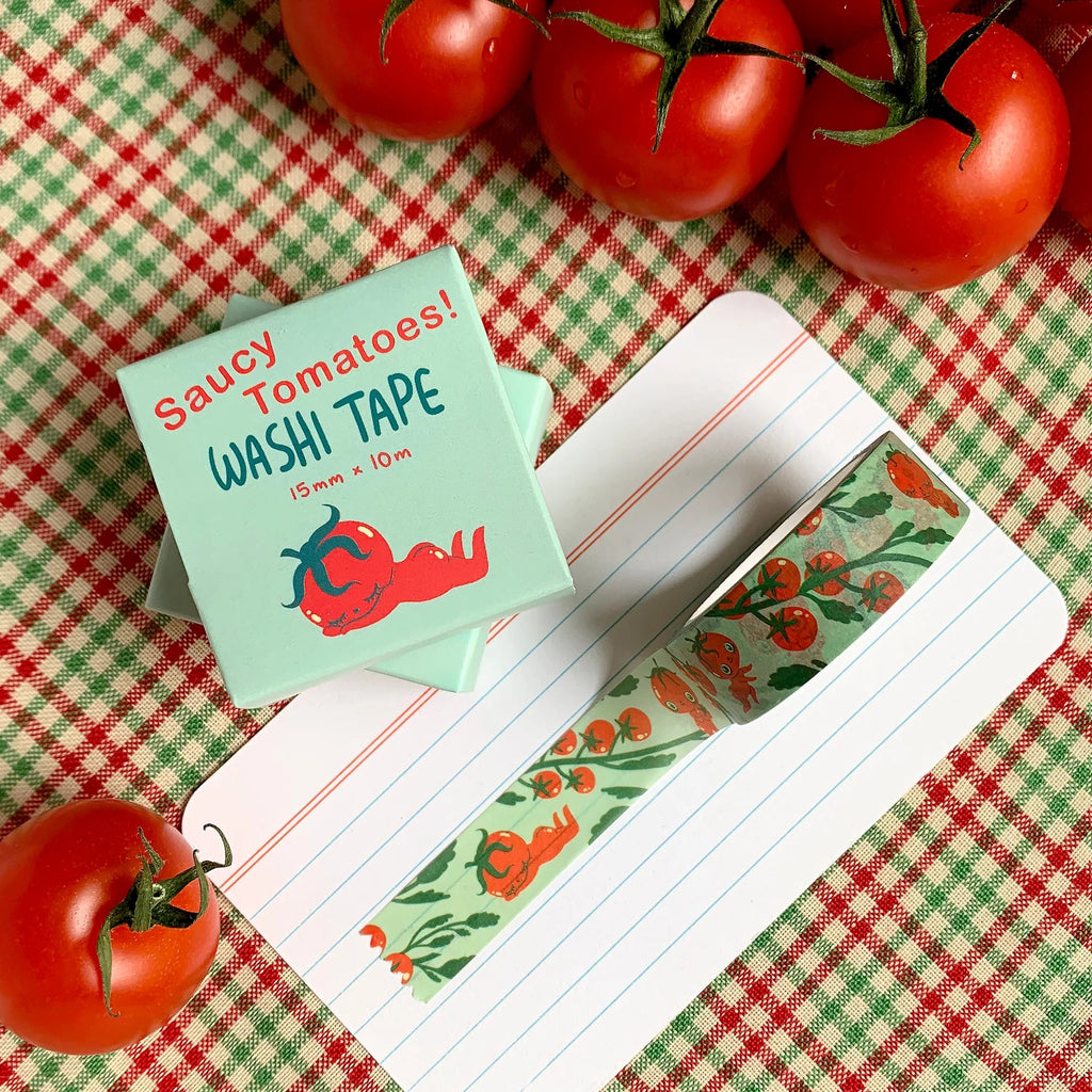 Washi tape with tomato design on a checkered tablecloth with tomatoes