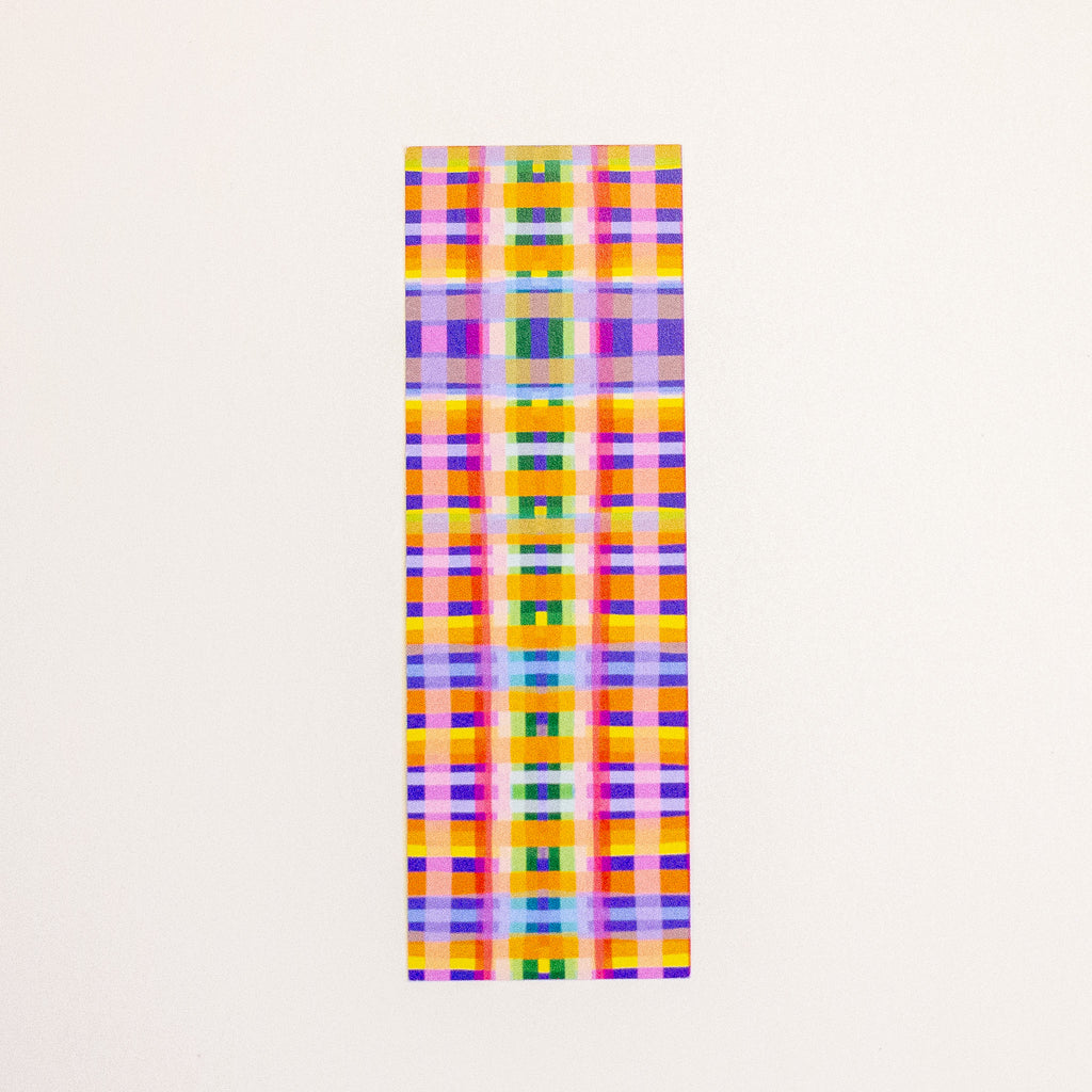 A rectangular postcard featuring a colourful plaid print on a off-white background. 