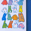 A white art print featuring a grid of colourful cartoon rabbits and creatures with blue outlines, displayed against a textured blue background.