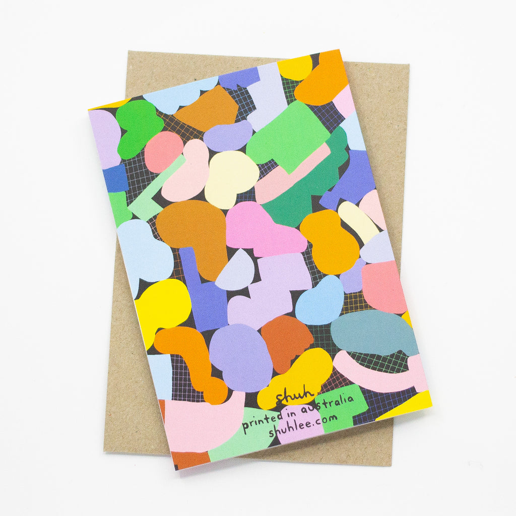 A Back picture of the terrain card print. Multicolour abstract shapes on a grid background.