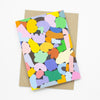 A front picture of the terrain card print. Multicolour abstract shapes on a grid background.